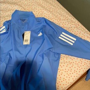 Light blue women’s adidas zip up jacket size XL